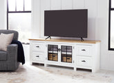 Prime Furniture - Ashley Furniture - Ashbryn 74" TV Stand - 74" / White/Natural - W844-68